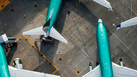 Grounded Boeing 737 Max airplanes sitting on the tarmac in Washington.