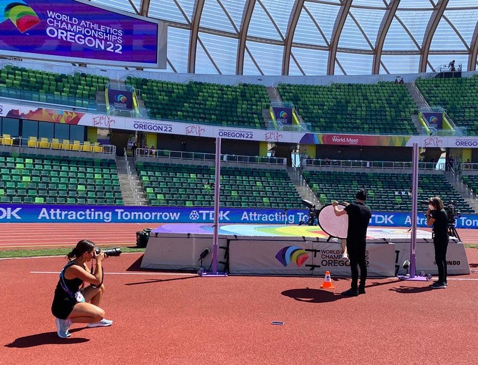 An SOJC student takes photos at the World Athletics Championships Oregon22
