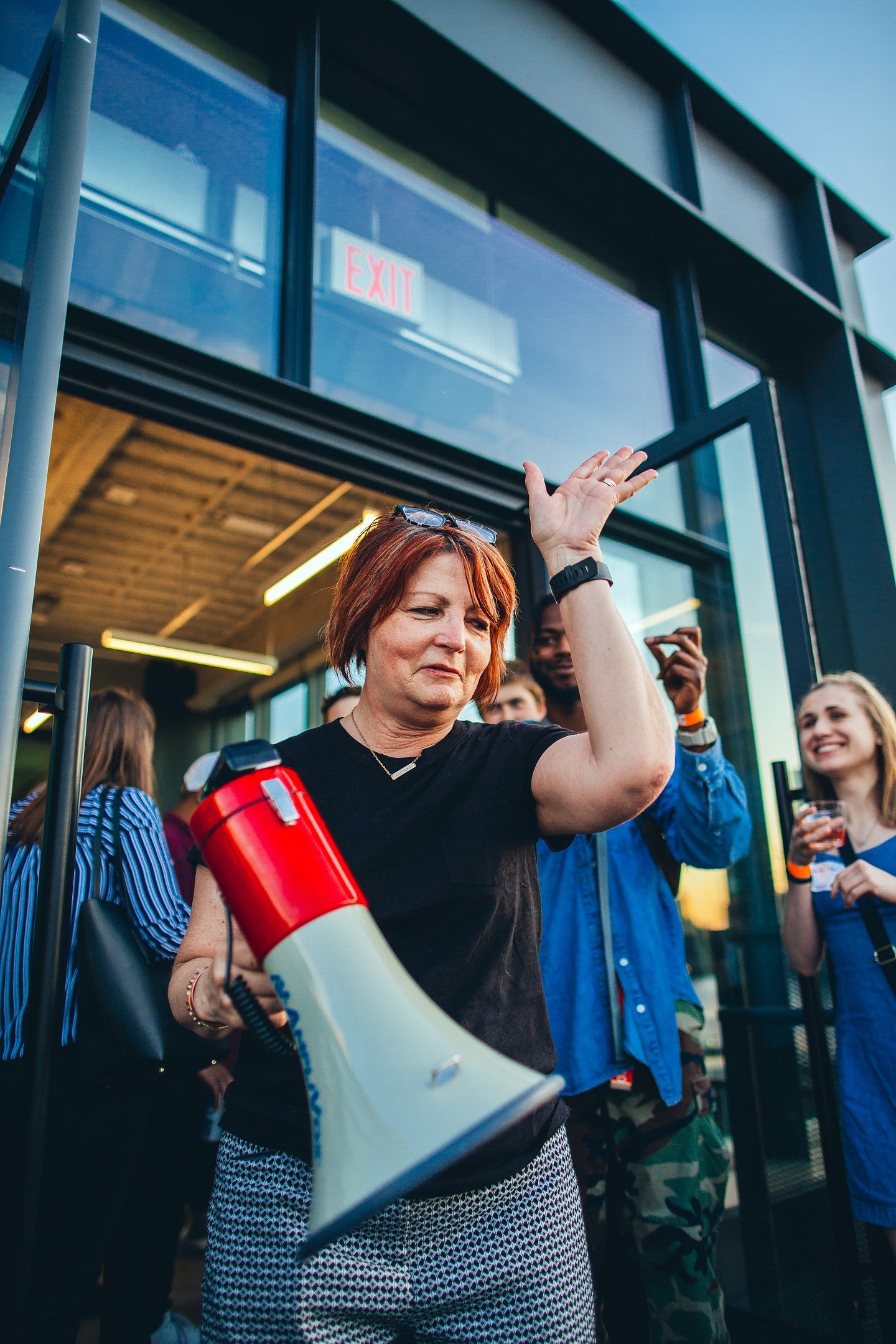 Deb Morrison holds a bullhorn