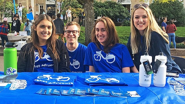 Allen Hall PR students giving out information about the PeaceHealth Rides program