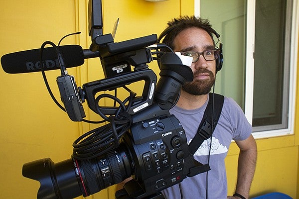 Zach Putnam behind a video camera