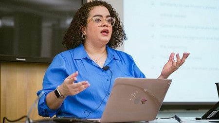 An SOJC PhD student teaches a class