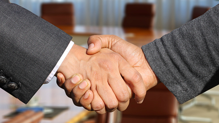 Two people shaking hands
