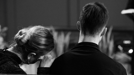 Two people grieve together as one puts their head on the other's shoulder (By Pavel Danilyuk from Pexels).