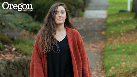 University of Oregon student walking on campus