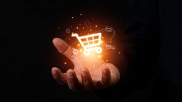 Stock image of hand holding ecommerce icon