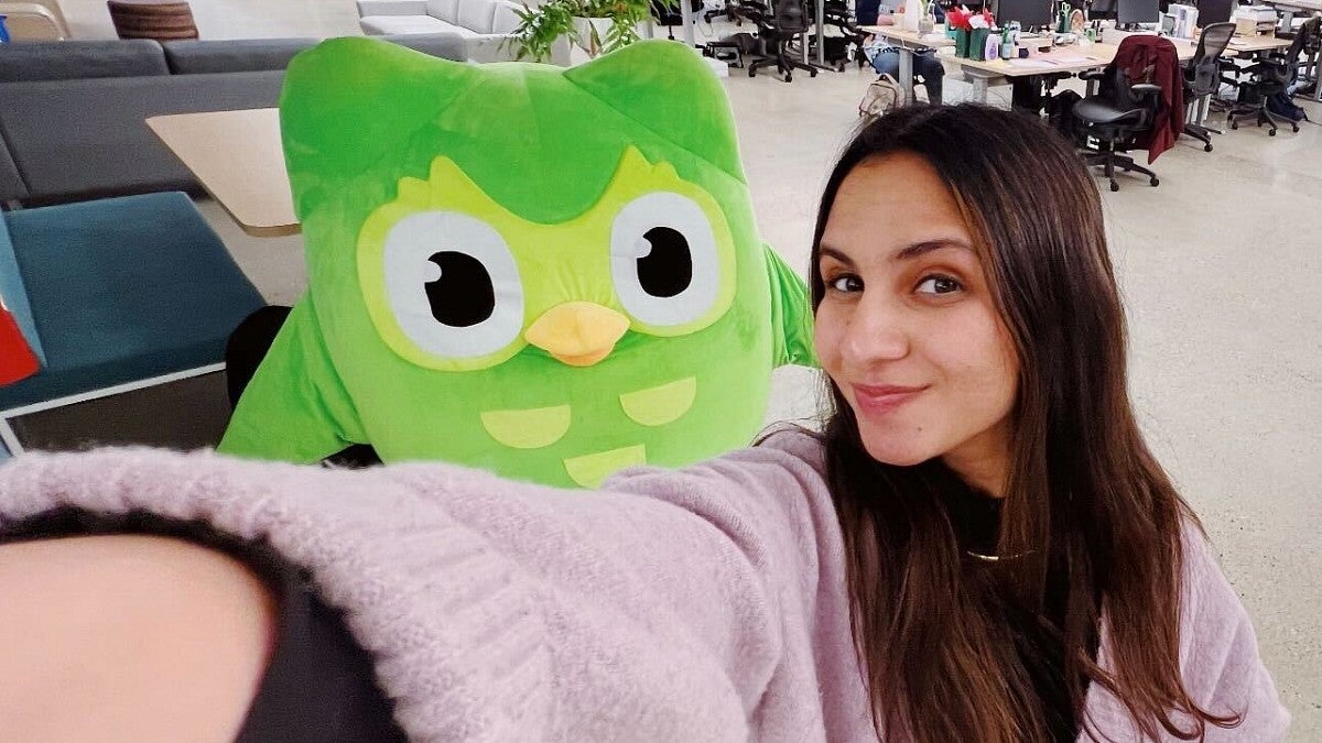 Zaria Parvez takes a selfie with Duo, the (in)famous green Duolingo owl