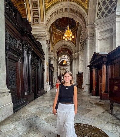 Nicole Alstrin poses in St. Paul's Cathedral in London