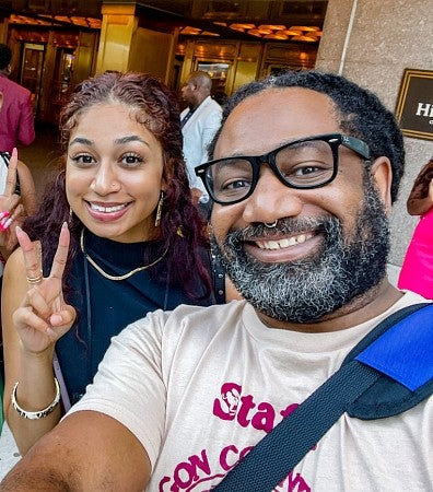 selfie of two students outside of the 2024 NABJ convention