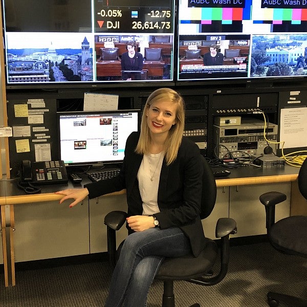 Emily Olson sitting in recording studio